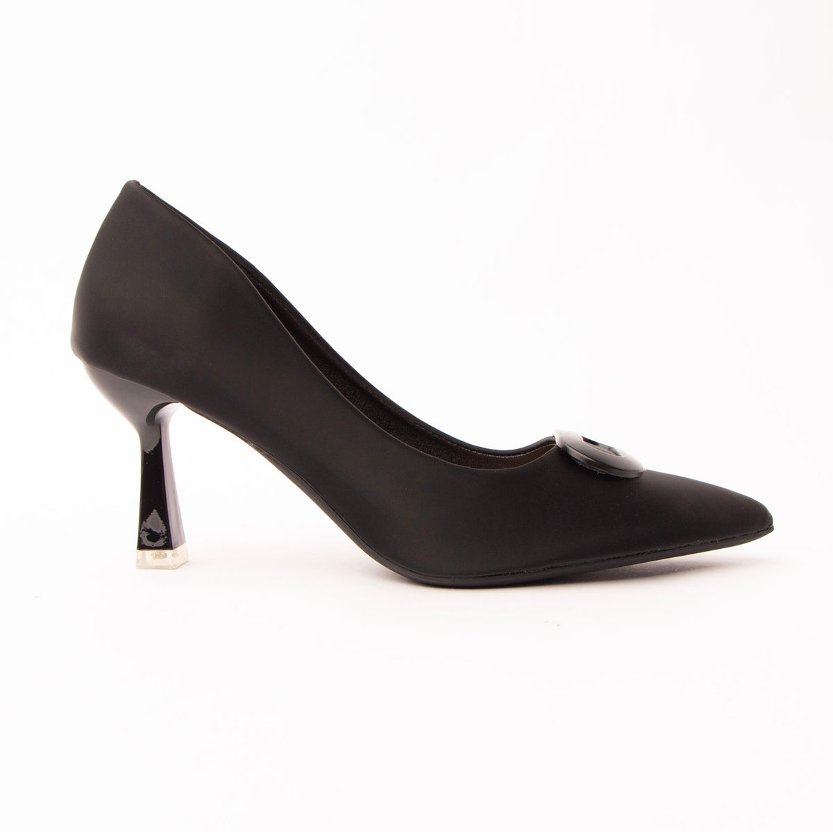 Black buckle court shoes for women, a seam-free matte black court with a softly scalloped topline and a wide patent-finish buckle plaque across the vamp, above a slender flared hourglass heel tipped in pale silver over a nude padded footbed