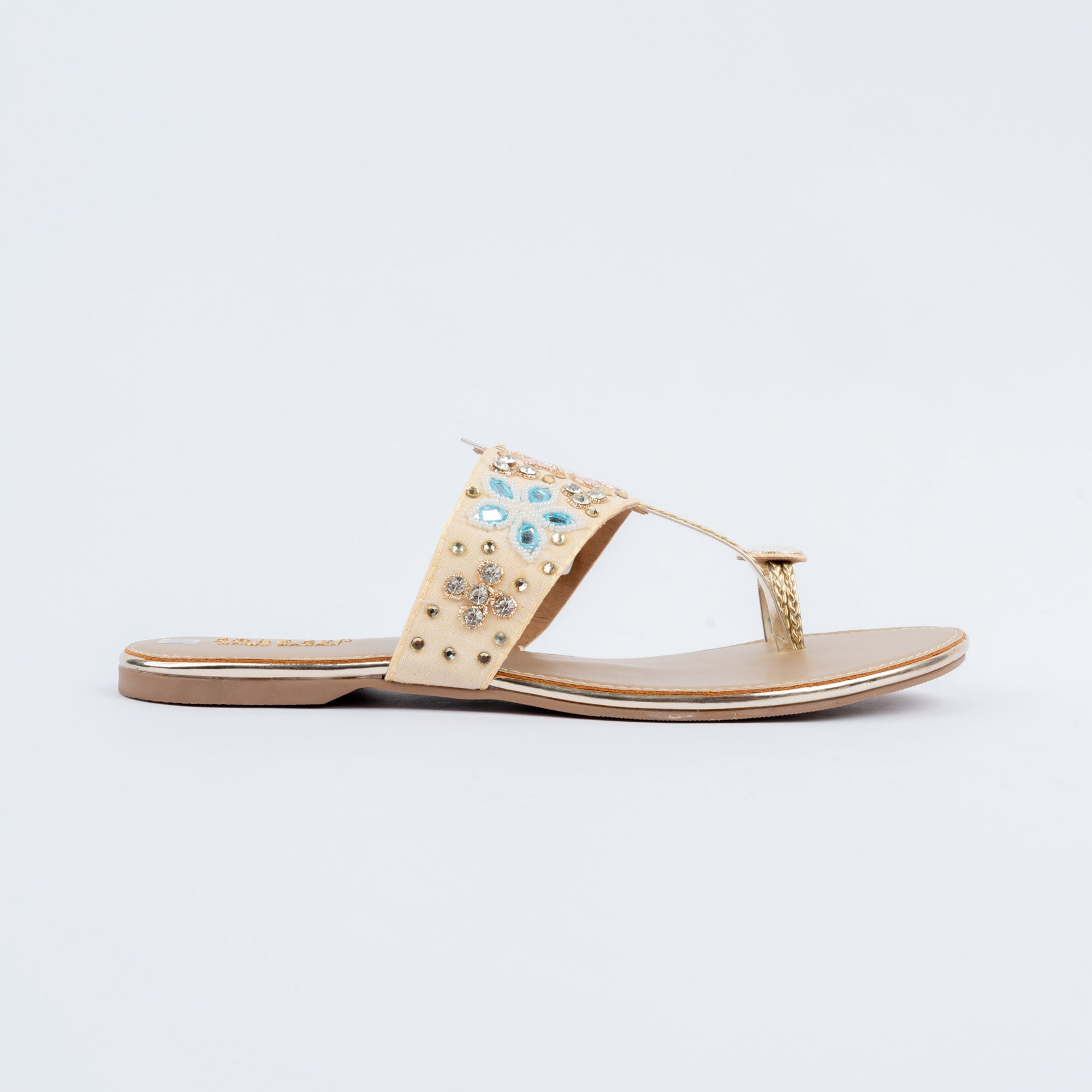 Gold toe ring embellished flats styled for everyday casual wear