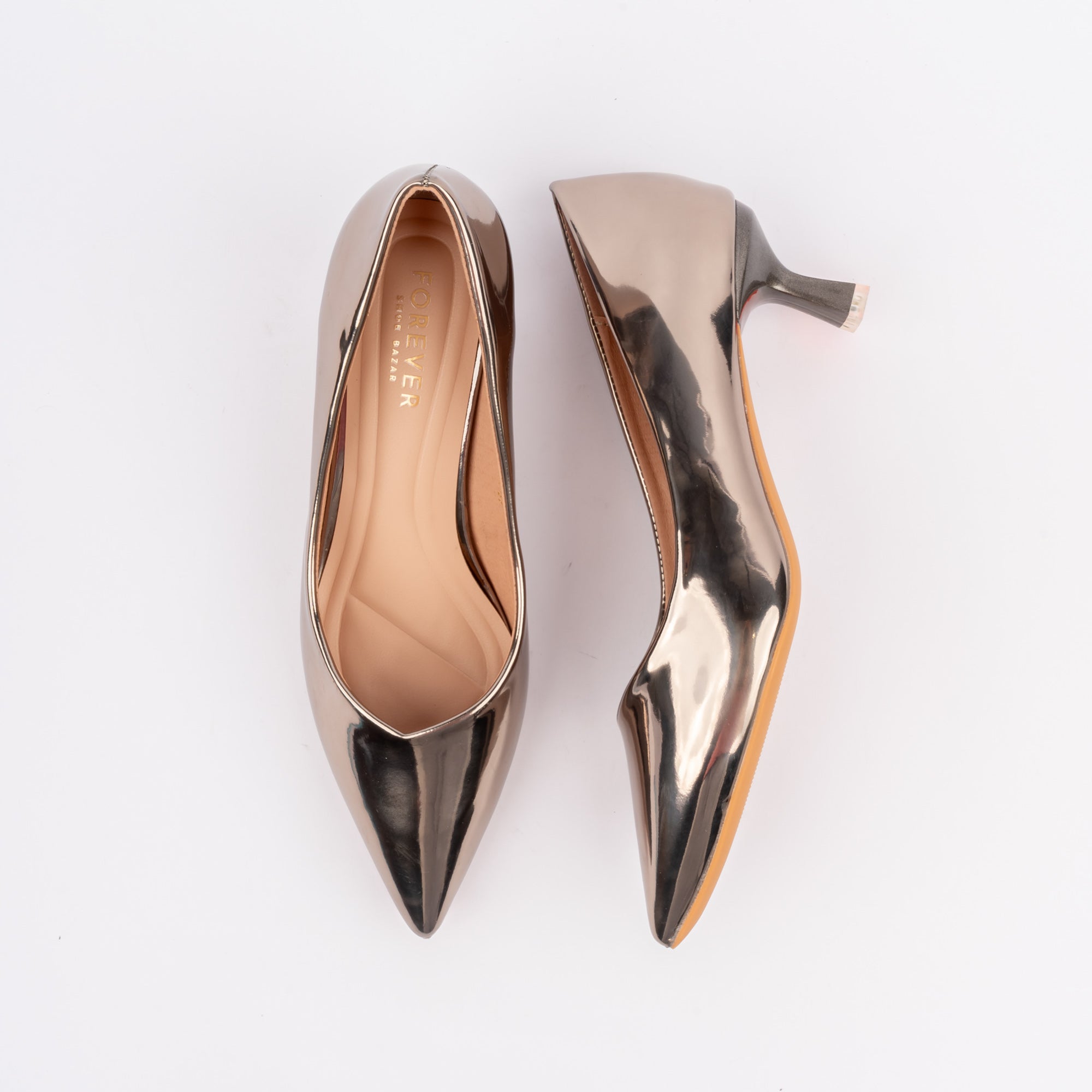 Grey pumps for women, a high-shine mirror-metallic upper cut to a low V throat line, a beige leather-look lining and footbed, and a slim flared spool kitten heel