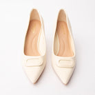 Beige buckle court shoes styled for everyday wear