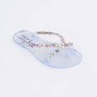 Transparent flat sandals styled for casual wear