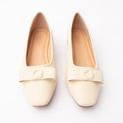 Beige pumps for women, both shoes from the front