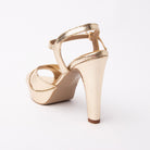 Gold snake print platform sandals for women with cushioned footbed, side view