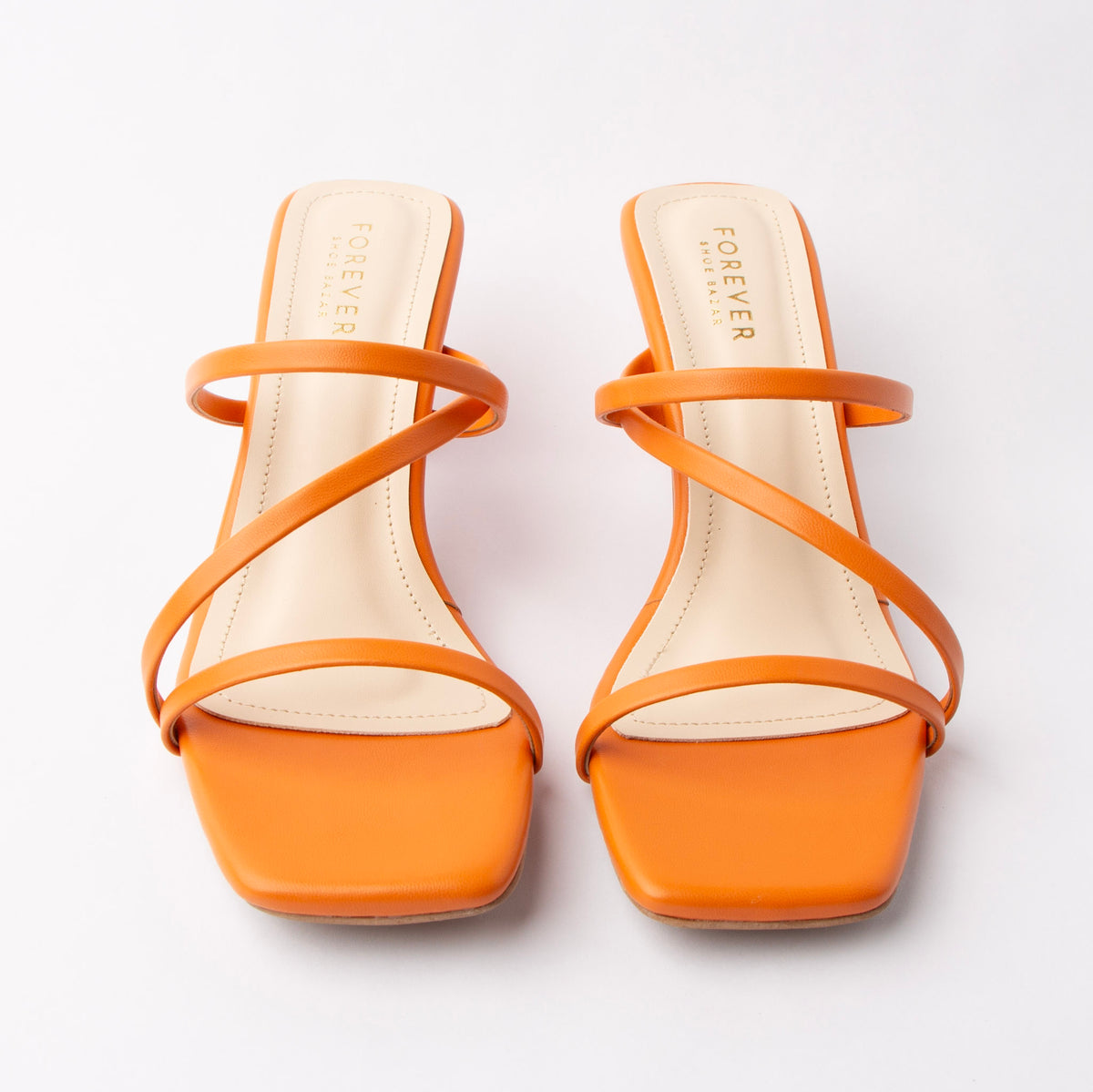Orange mules for women, both shoes from the front