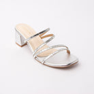 Silver criss cross strap mules styled for party wear