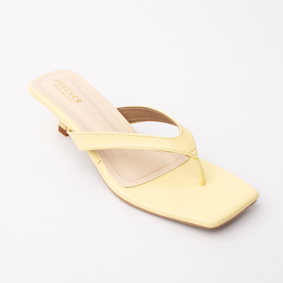 Yellow toe-post kitten heel mules for women, three-quarter view