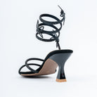 Black block heel sandals styled for party wear