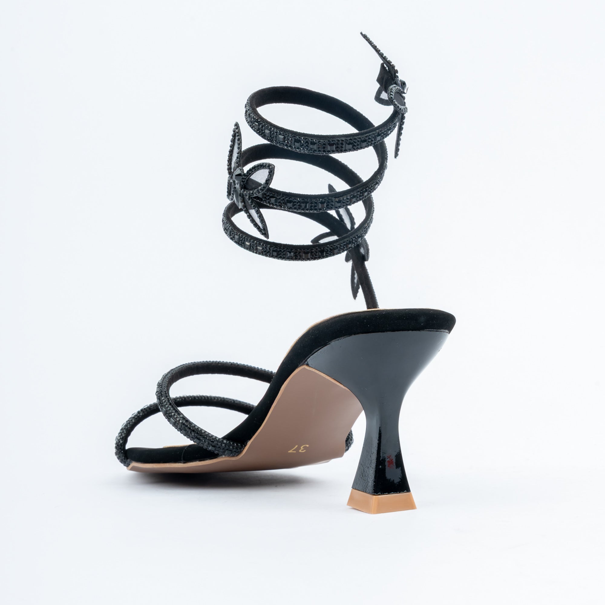 Black block heel sandals styled for party wear
