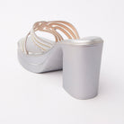 Silver beaded platform mules for women with cushioned footbed, side view