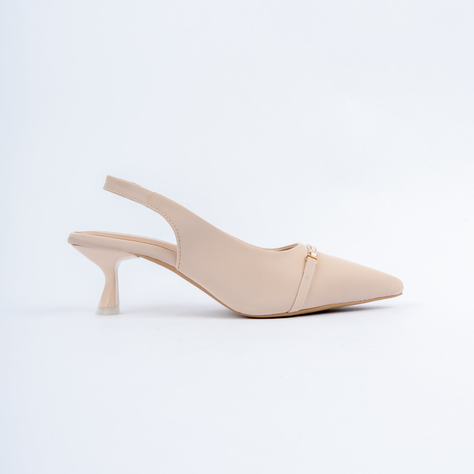 Cream pumps for women with cushioned footbed, side view