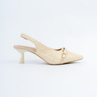 Beige pumps styled for casual wear