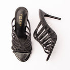 Black mules for women, both shoes laid flat