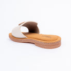 Cream flats for women with cushioned footbed, side view