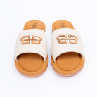 Cream ballet flats styled for everyday casual wear