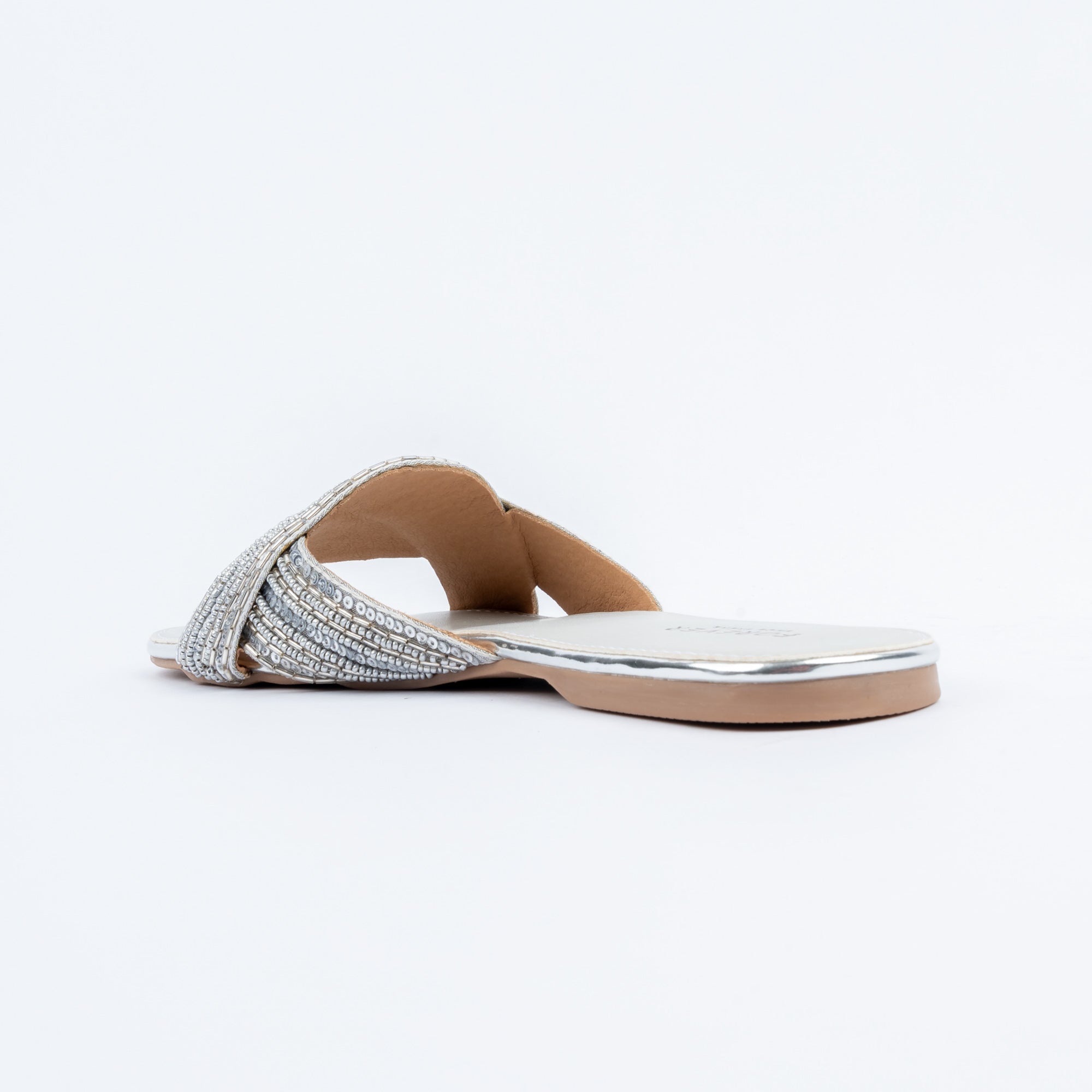 Silver flats for women with cushioned footbed, side view