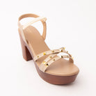 Beige studded platform heels styled for casual wear