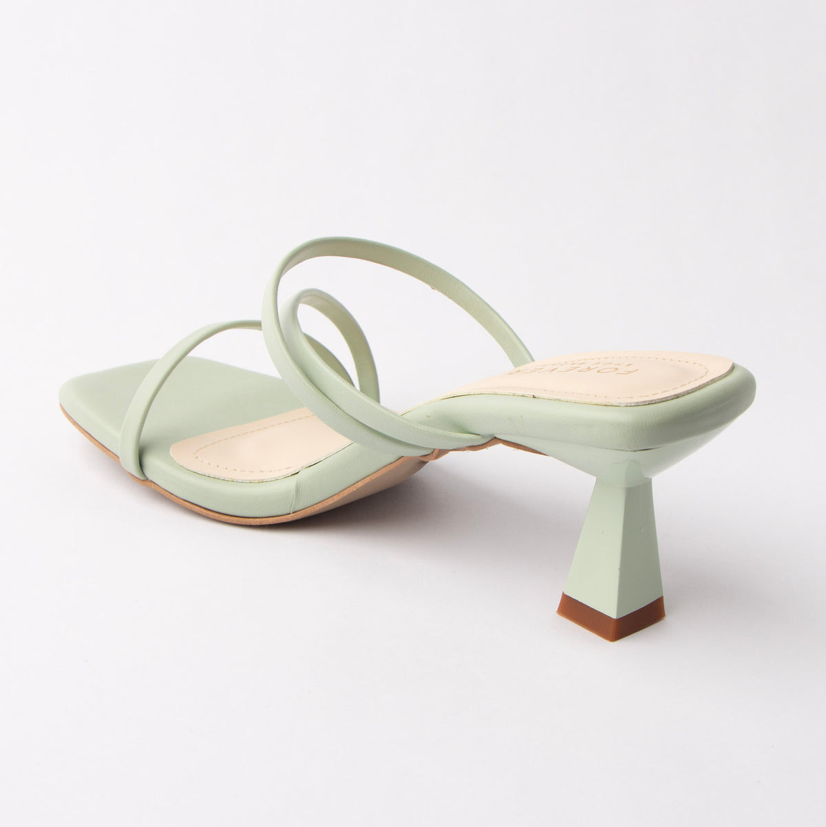 Green mules for women, back view showing the heel