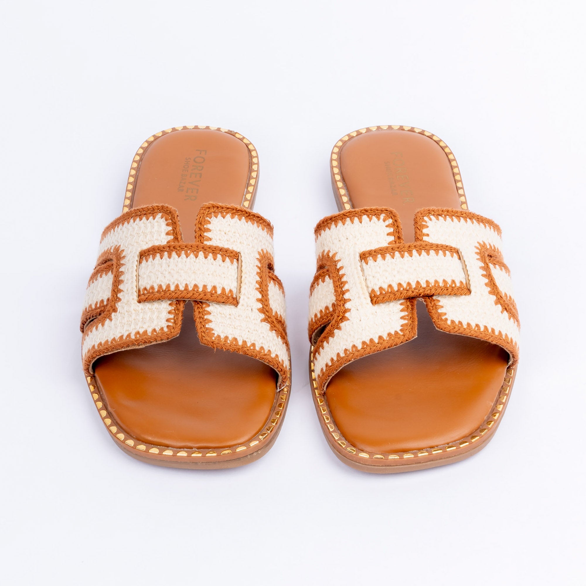 Tan whipstitch ballet flats styled for everyday casual wear
