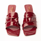 Maroon patent mules styled for everyday wear