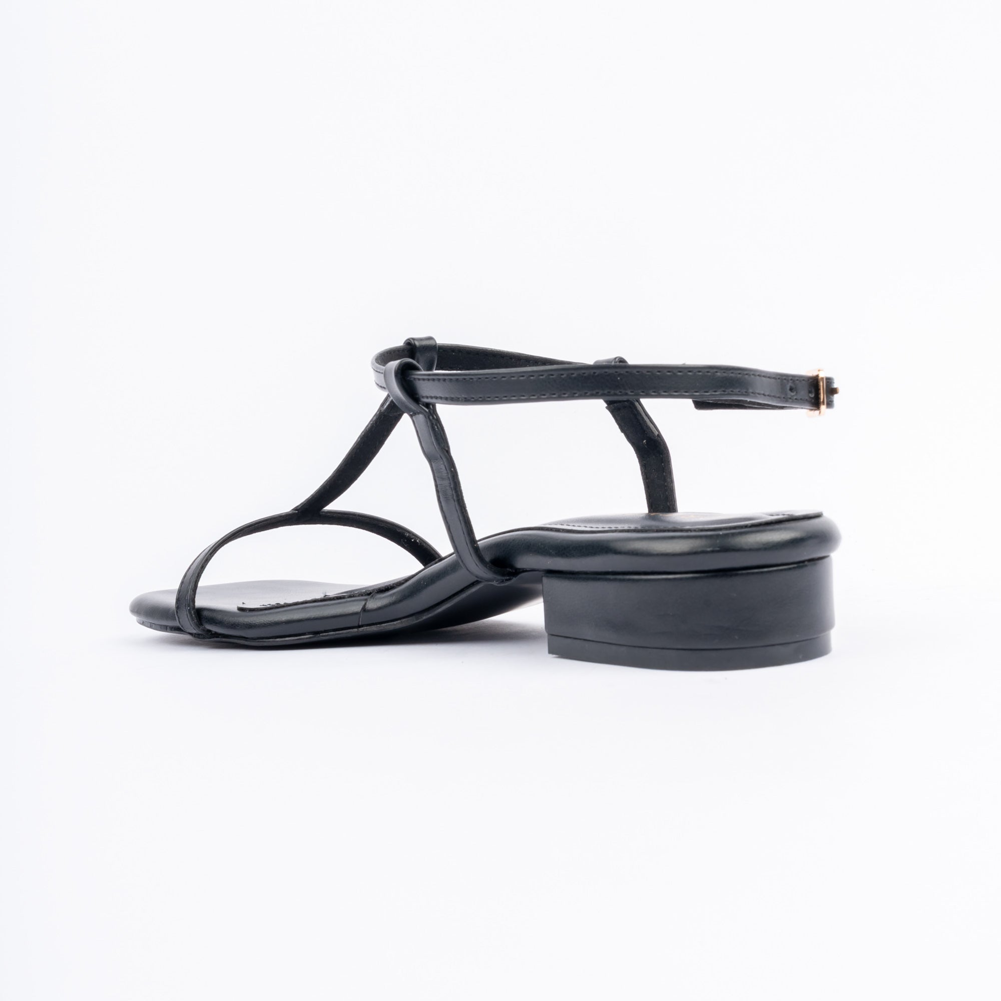 Black block heel sandals styled for casual wear