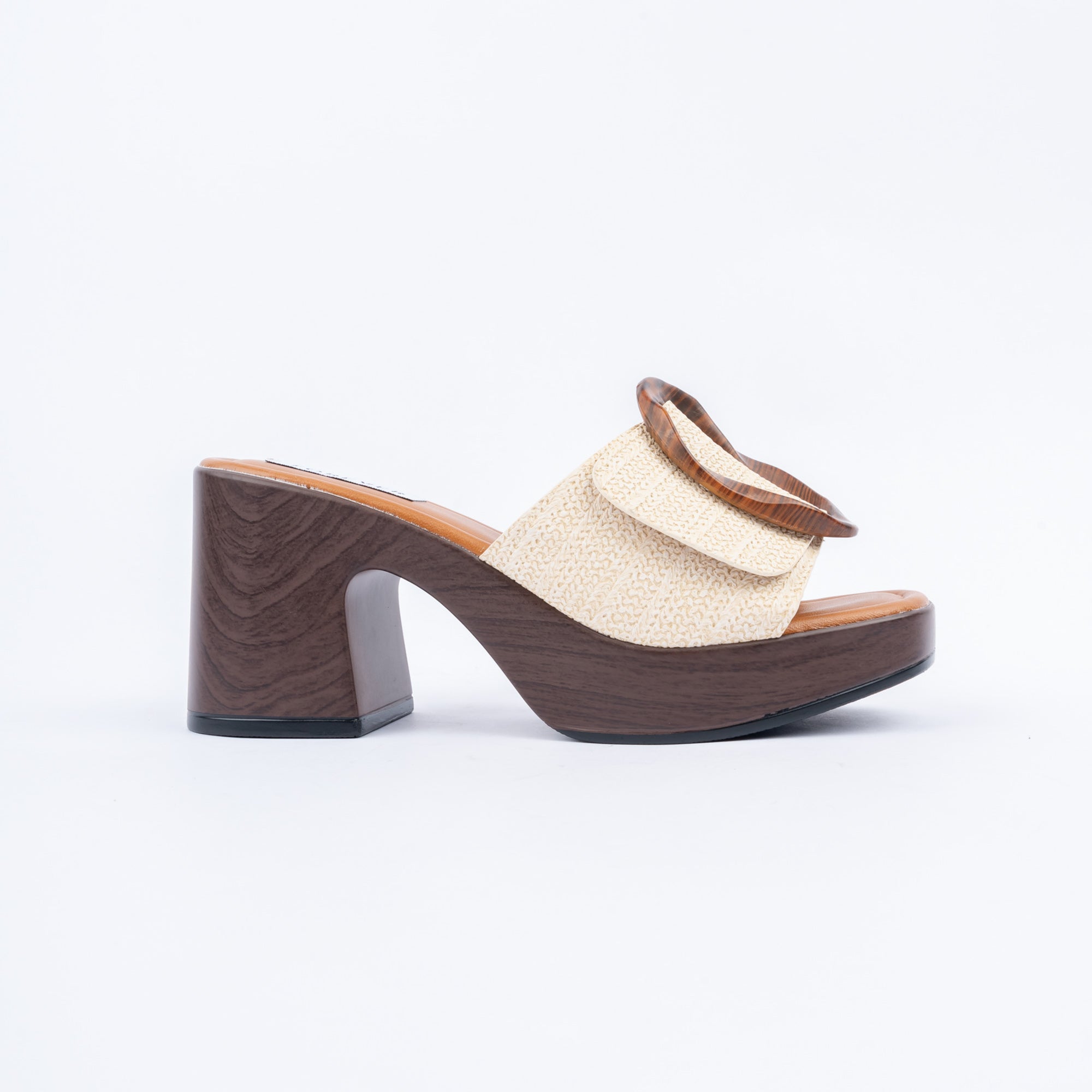 Beige platform heel mules styled for casual wear
