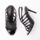Black sandals for women, both shoes laid flat