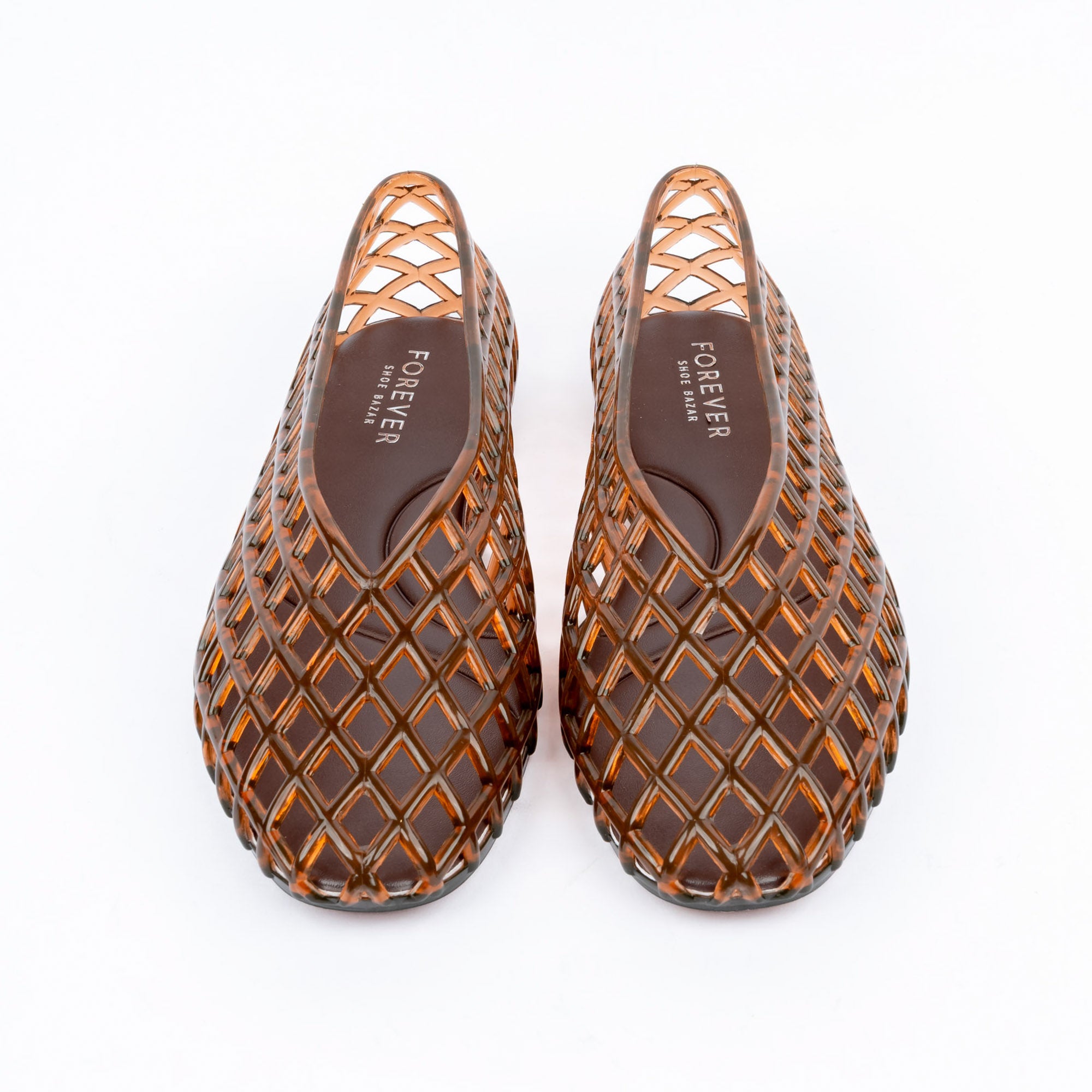 Coffee brown jelly flats styled for casual wear