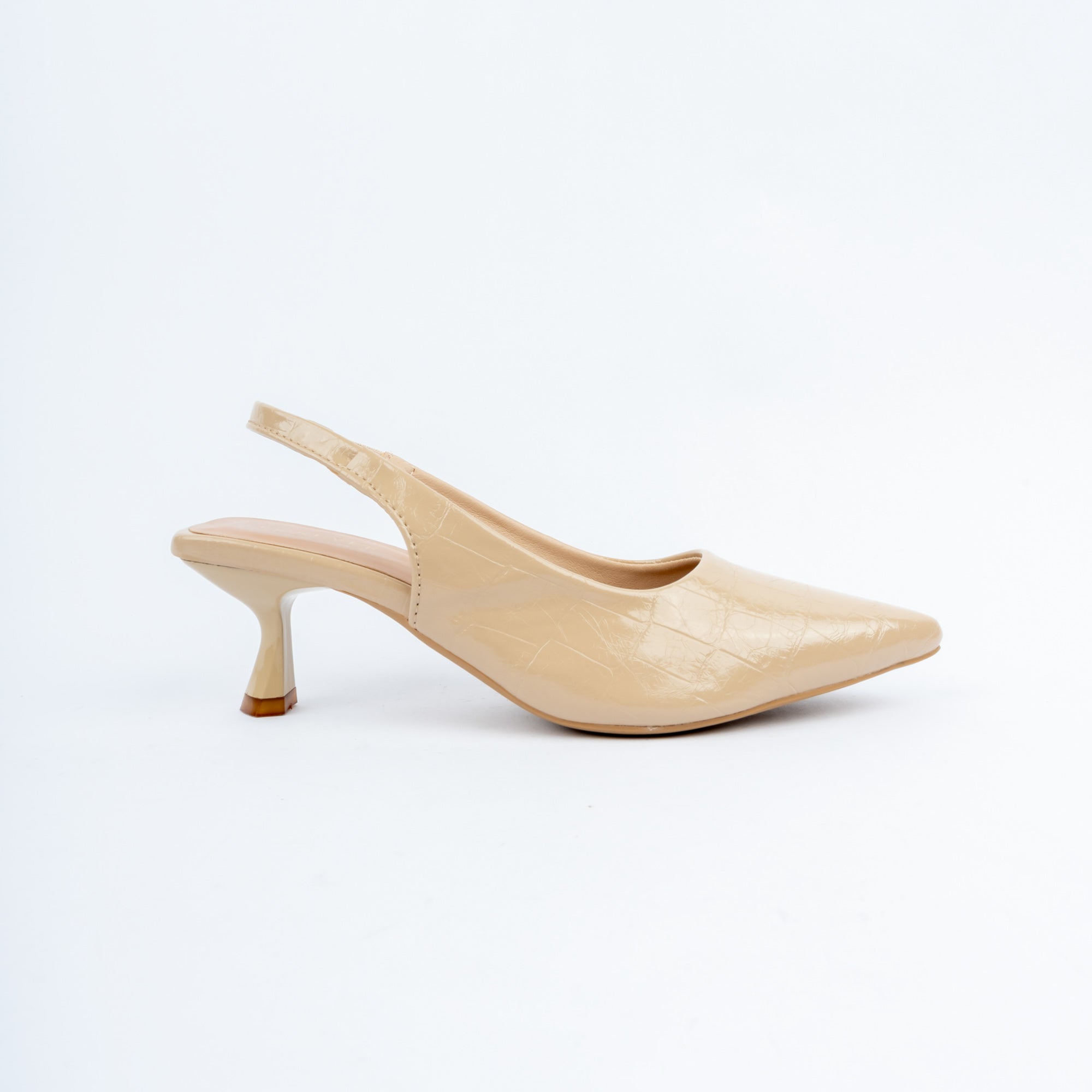 Beige pumps styled for casual wear