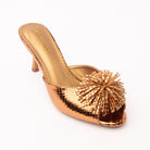 Brown mules for women, three-quarter view