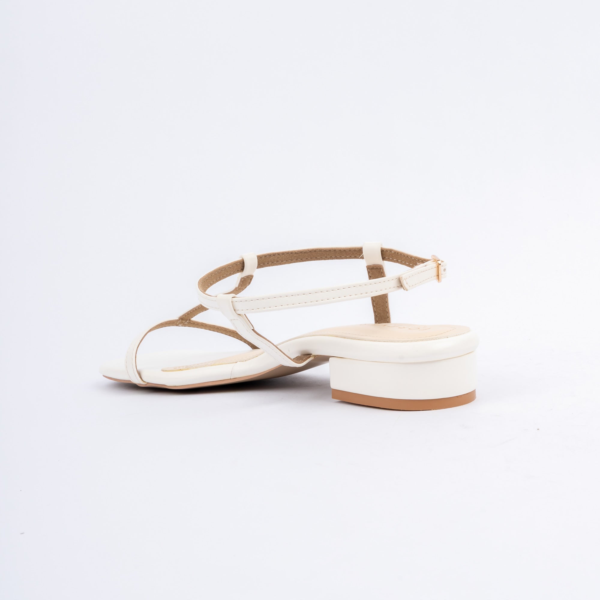 White block heel sandals styled for casual wear