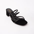 Black criss cross strap mules styled for party wear