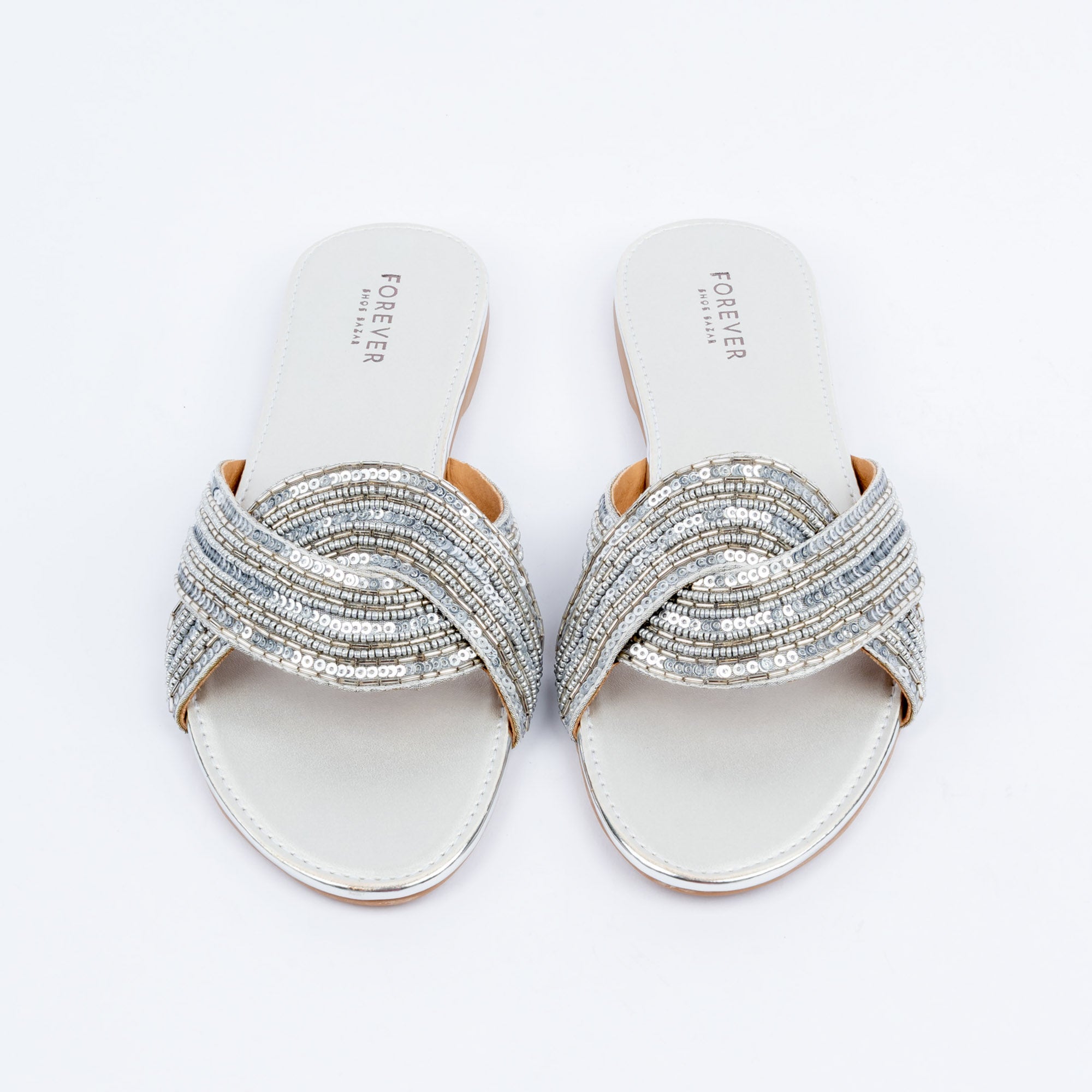 Silver metallic party flats styled for party and festive wear