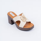 Beige platform heel mules styled for casual wear