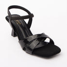 Black kitten heel sandals styled for casual wear