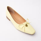 Yellow pumps for women, three-quarter view