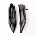 Black pumps for women, both shoes laid flat
