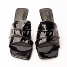 Black patent mules styled for everyday wear