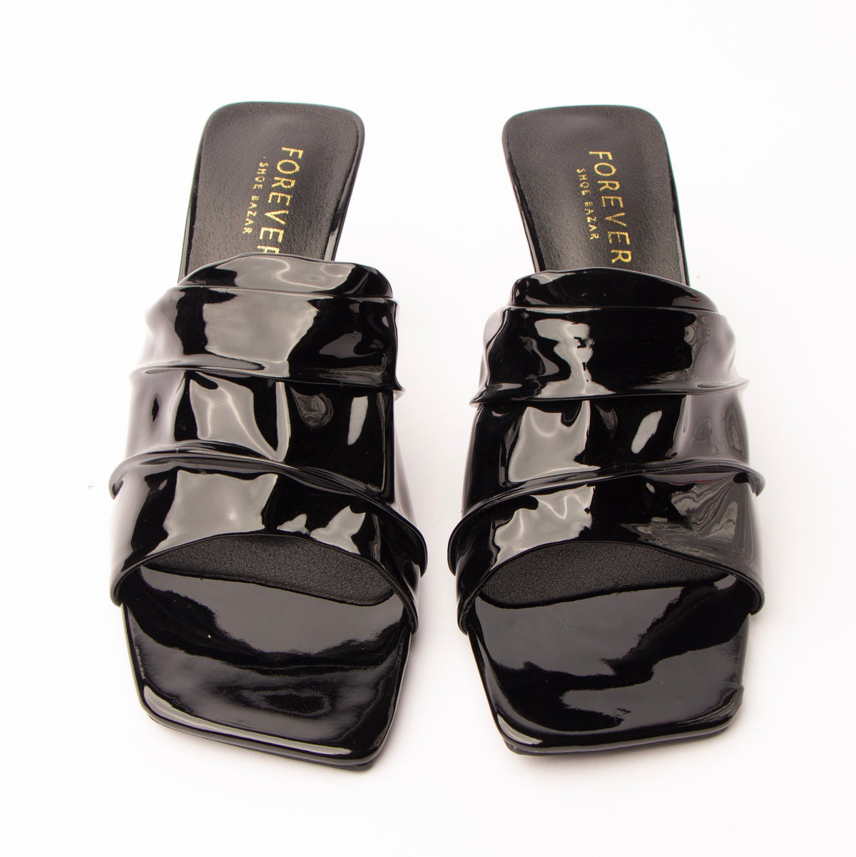 Black patent mules styled for everyday wear