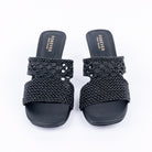 Black kitten heel mules styled for casual wear
