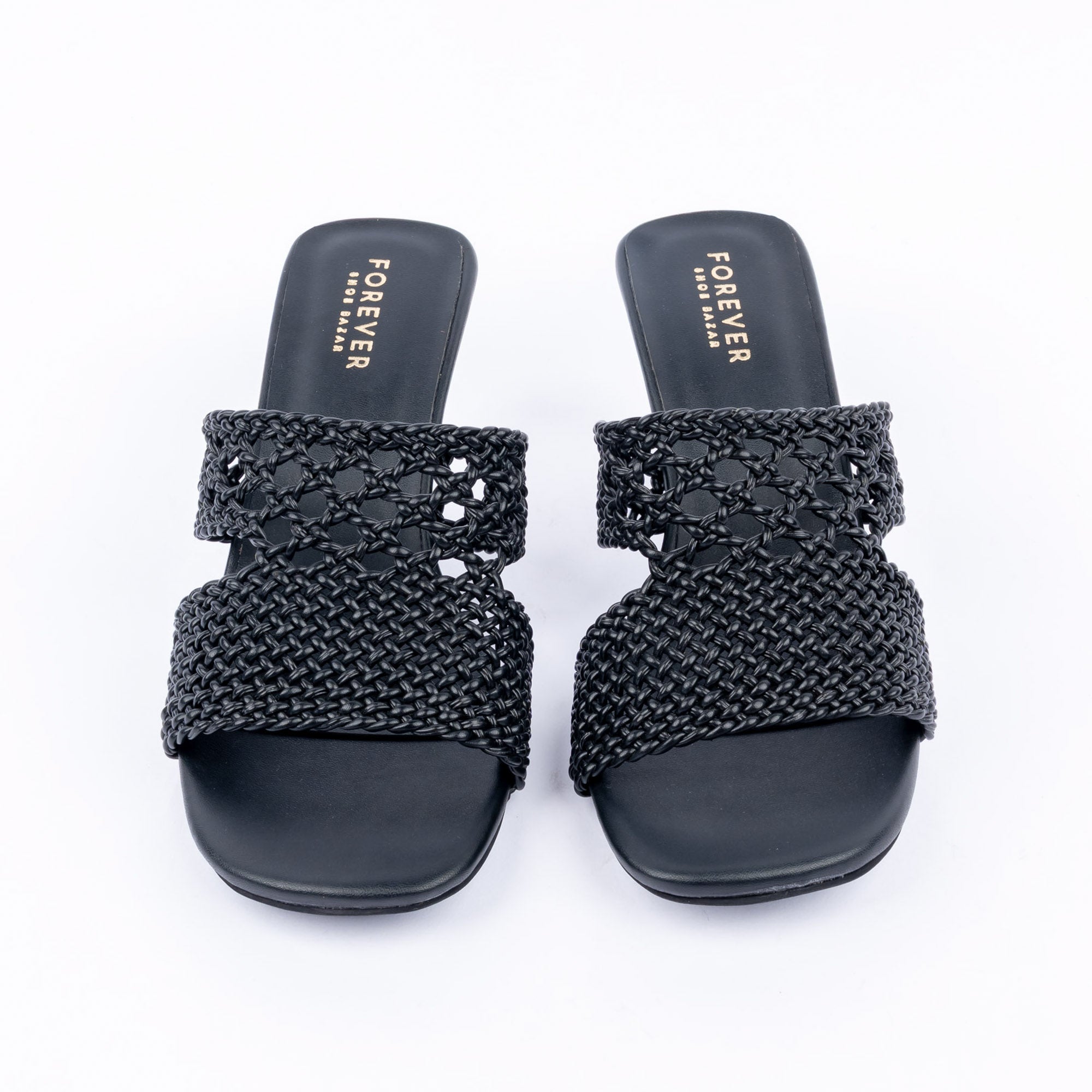 Black kitten heel mules styled for casual wear