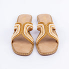 Beige beaded ballet flats styled for everyday casual wear