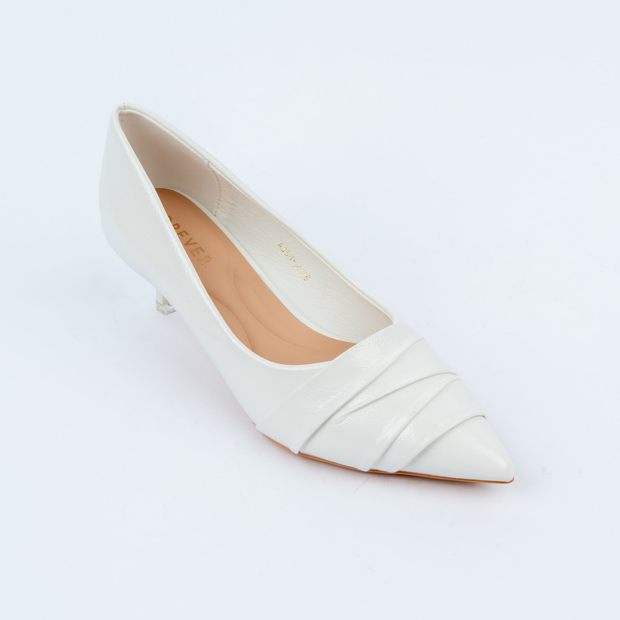 White pumps for women with cushioned footbed, side view
