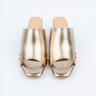 Gold block heel mules styled for party wear