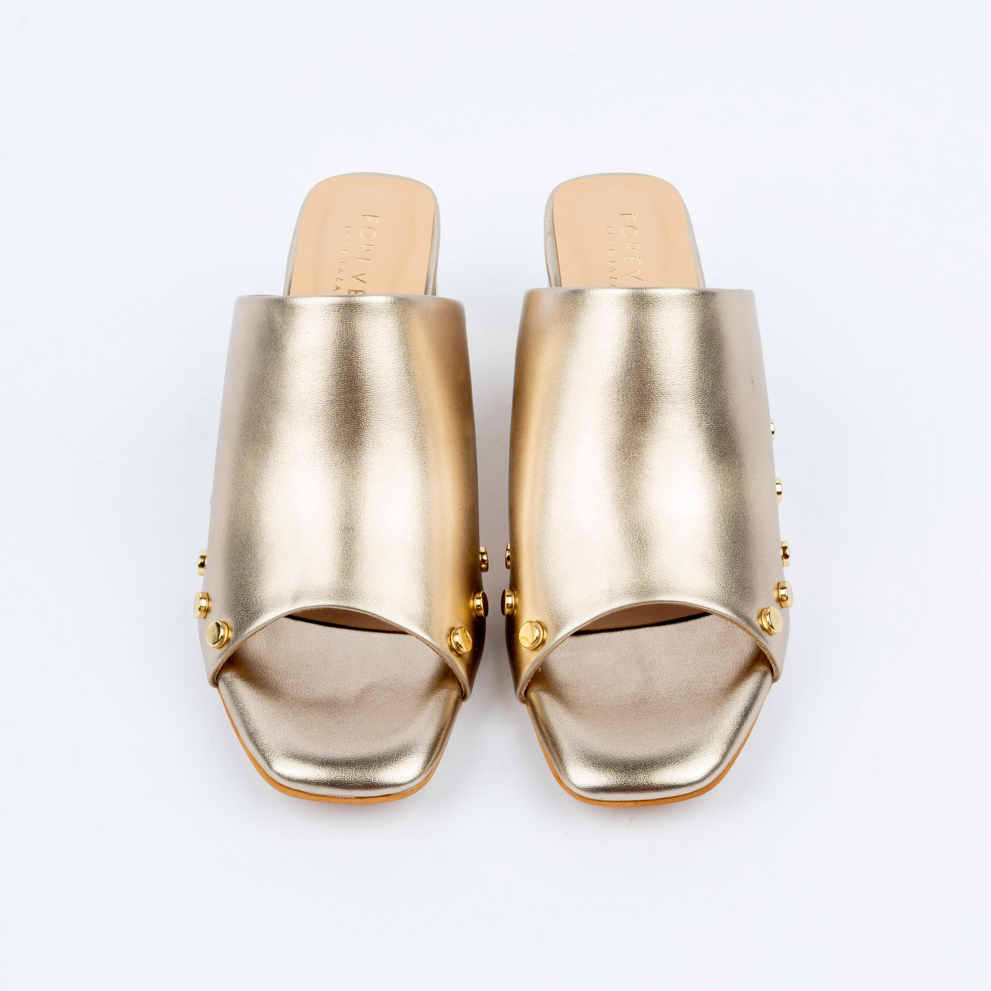 Gold block heel mules styled for party wear