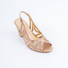Champagne peep toe heels styled for party wear