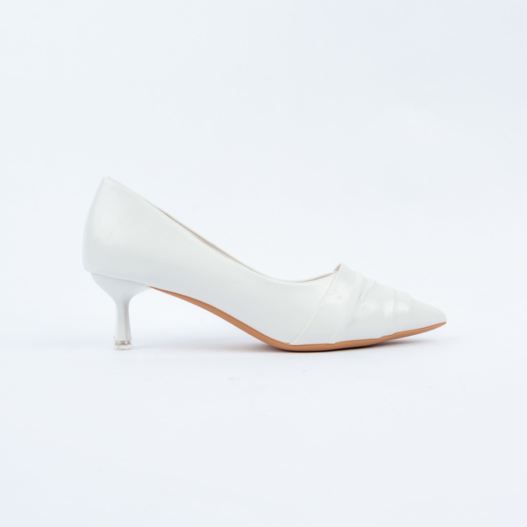White pumps styled for casual wear