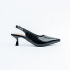 Black pumps styled for casual wear