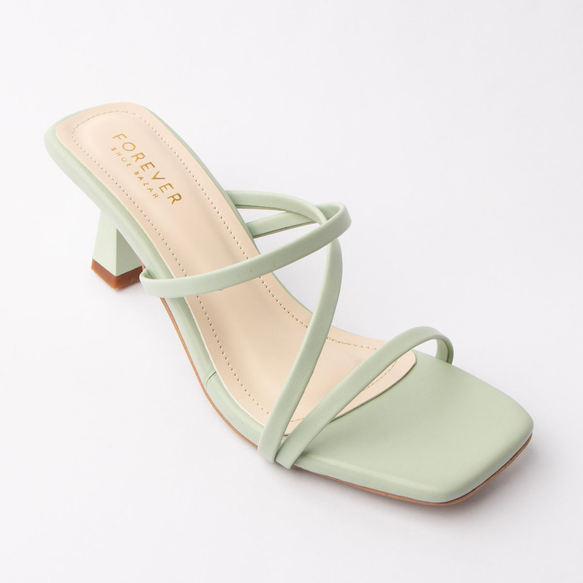 Green mules for women, three-quarter view