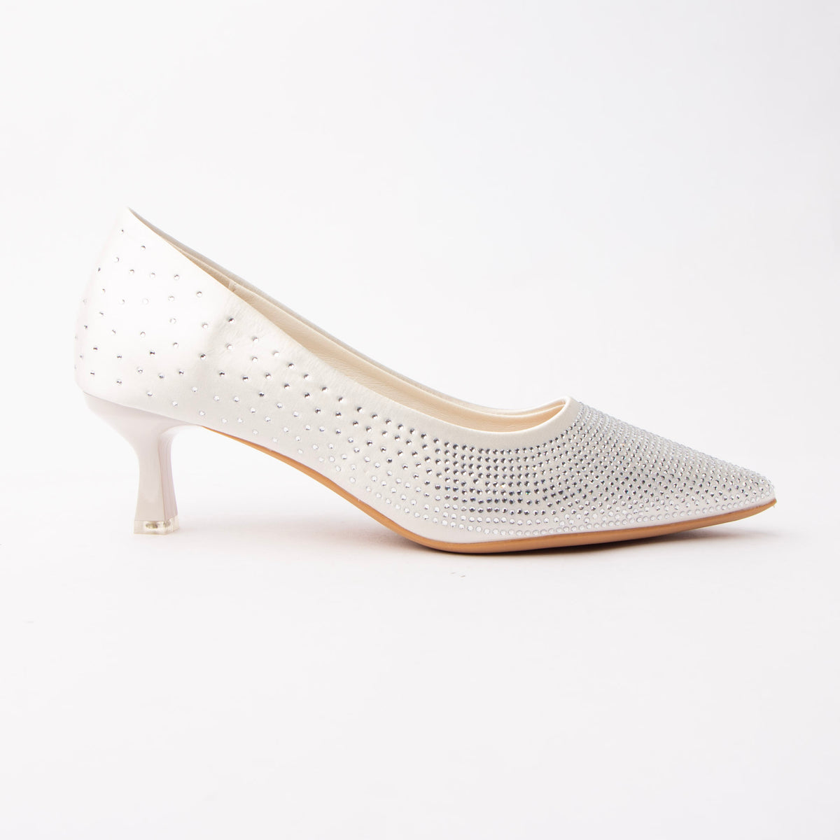 White crystal kitten heel pumps for women, ivory-white satin paved with tiny clear silver-mirror crystals, dense across the pointed toe and scattering away towards the heel, on a self-covered flared spool kitten heel with a clear tip and a nude padded footbed