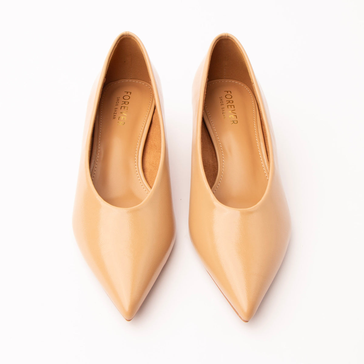 Beige pumps for women, both shoes from the front